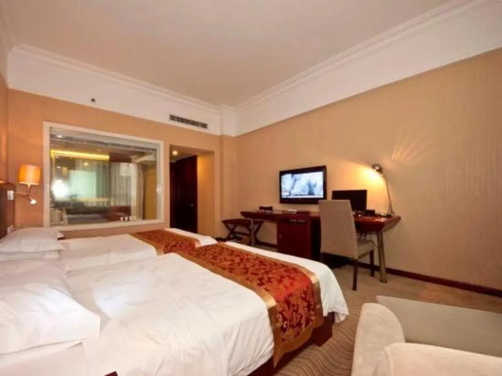 Bed in Fujian Galaxy Garden Hotel