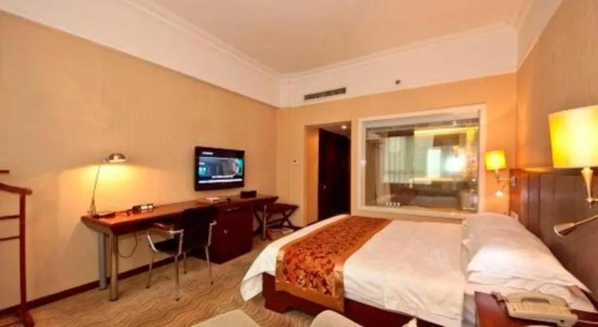 Bed in Fujian Galaxy Garden Hotel