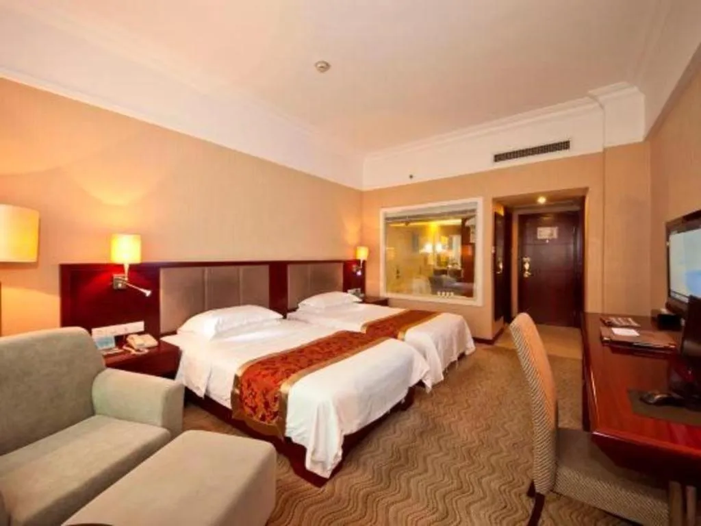 Bed in Fujian Galaxy Garden Hotel