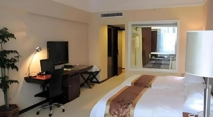 Bed in Fujian Galaxy Garden Hotel