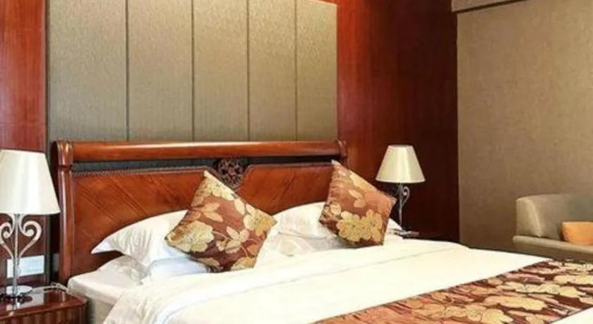 Bed in Fujian Galaxy Garden Hotel