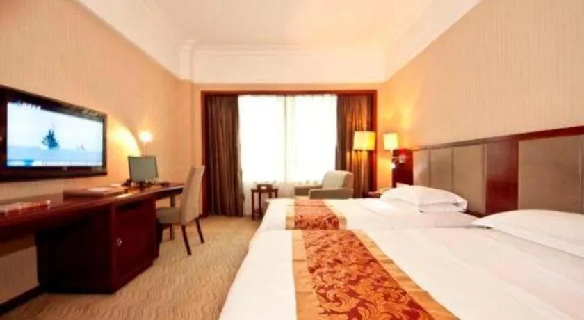 Bed in Fujian Galaxy Garden Hotel