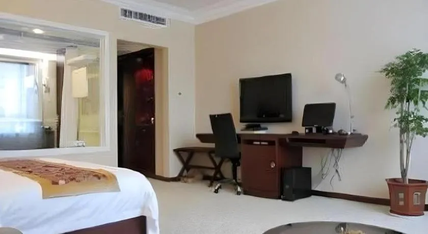 Bed in Fujian Galaxy Garden Hotel