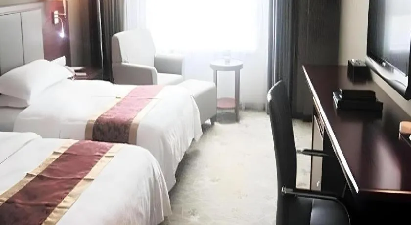 Bed in Fujian Galaxy Garden Hotel