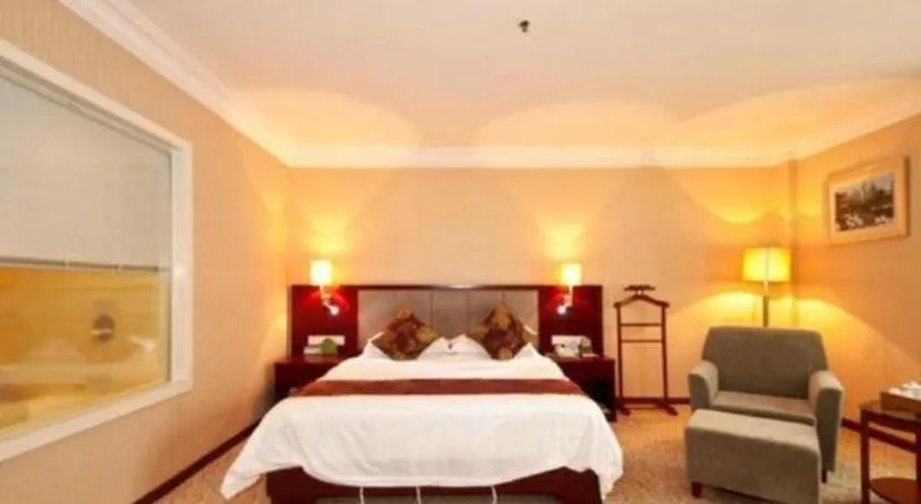 Bed in Fujian Galaxy Garden Hotel