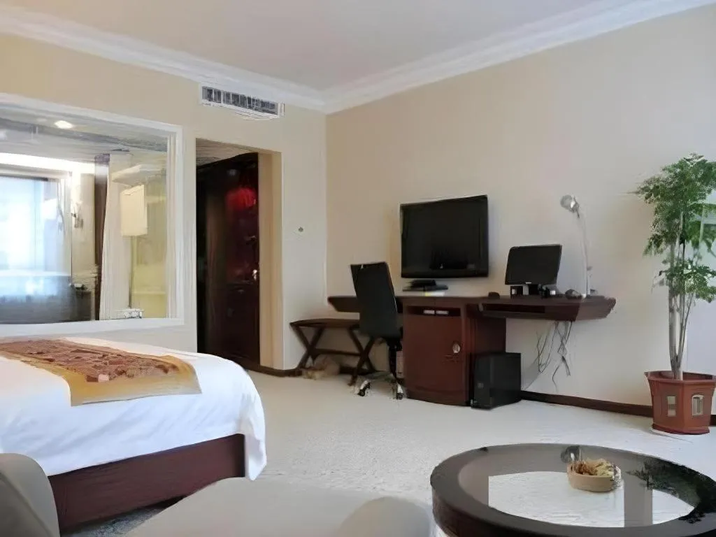 Bed in Fujian Galaxy Garden Hotel