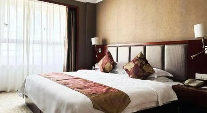 Bed in Fujian Galaxy Garden Hotel