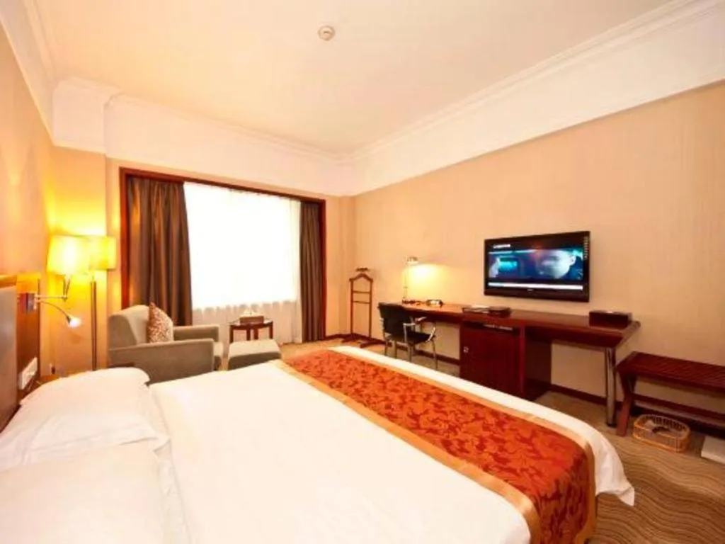 Bed in Fujian Galaxy Garden Hotel