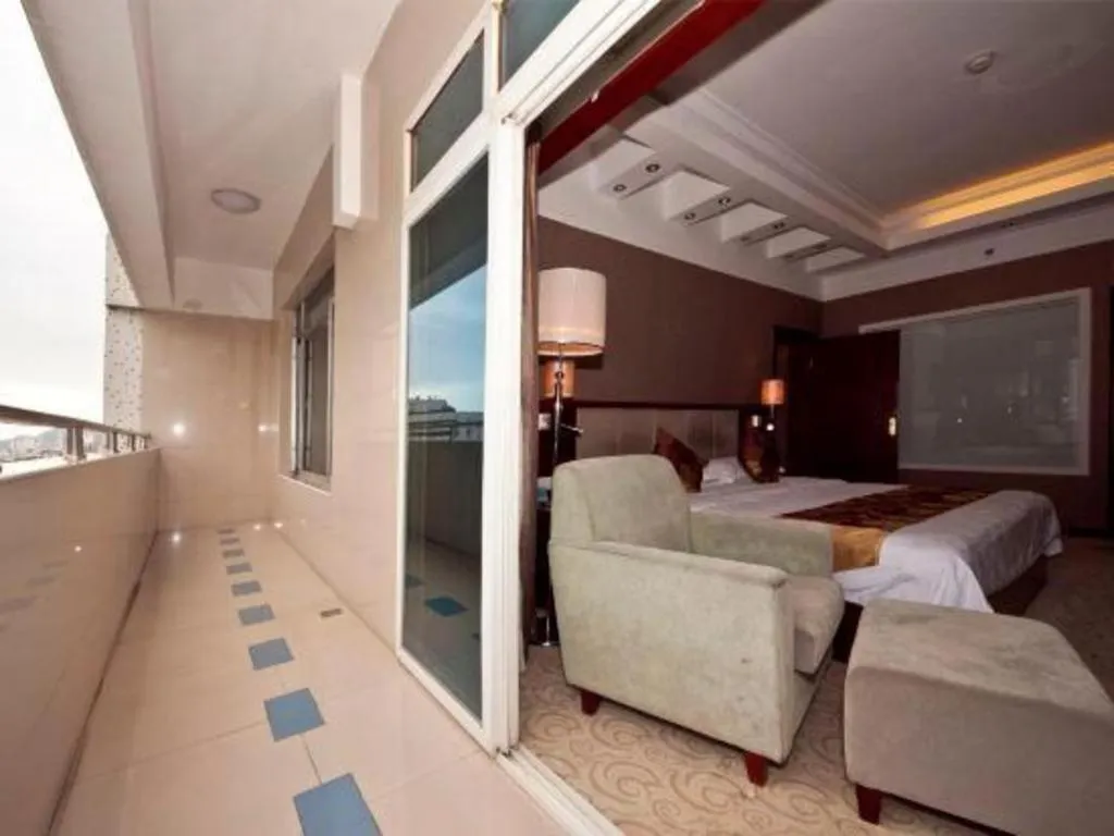 Bed in Fujian Galaxy Garden Hotel