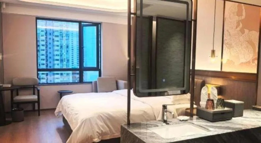 Bed in Fujian Galaxy Garden Hotel