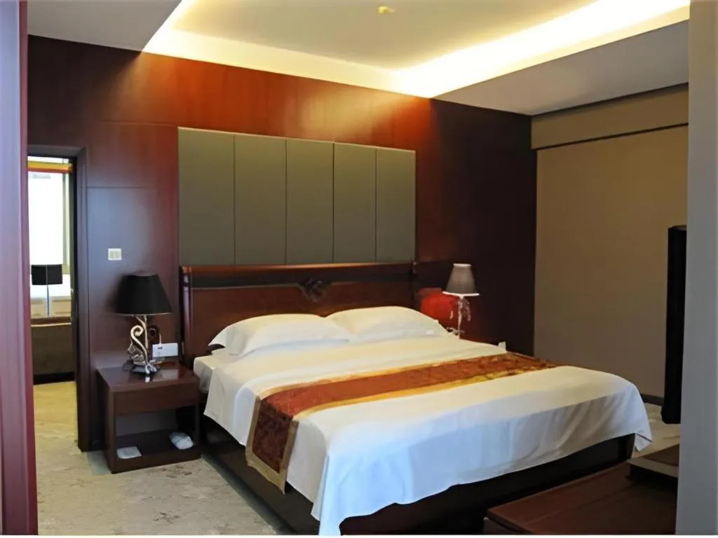 Bed in Fujian Galaxy Garden Hotel