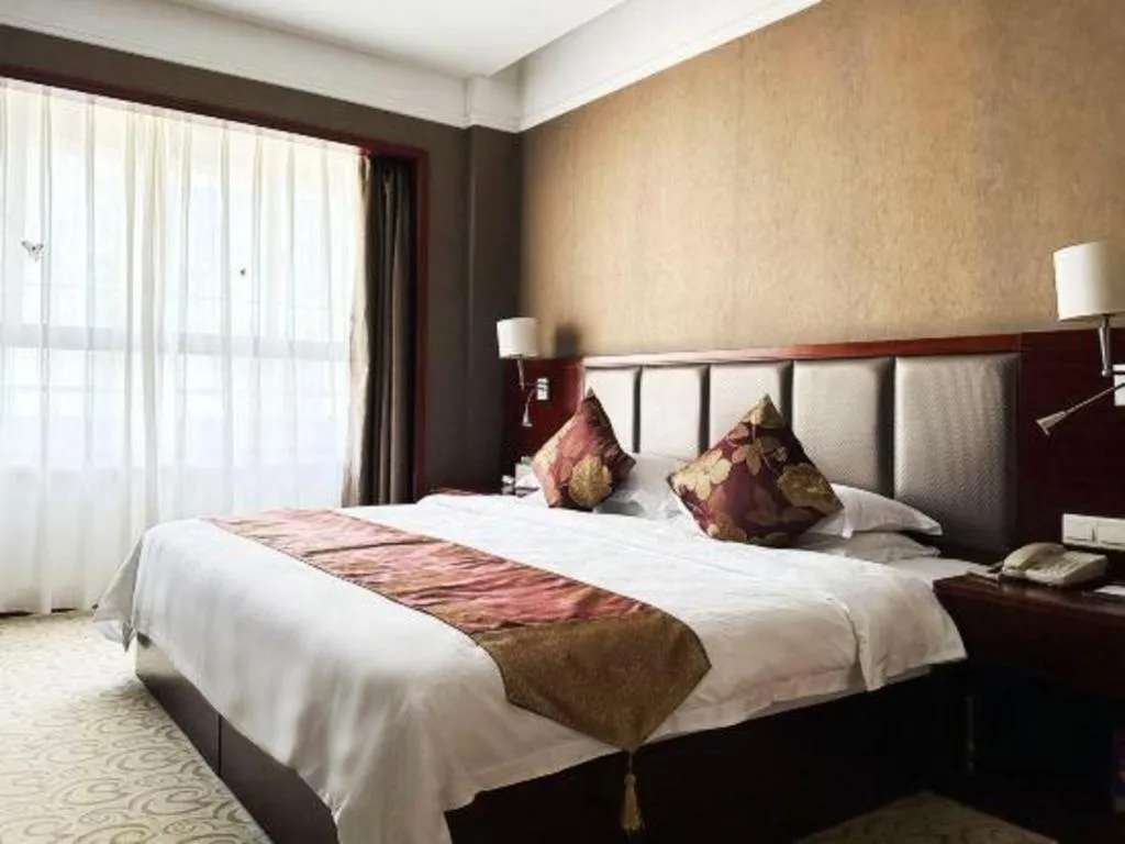 Bed in Fujian Galaxy Garden Hotel