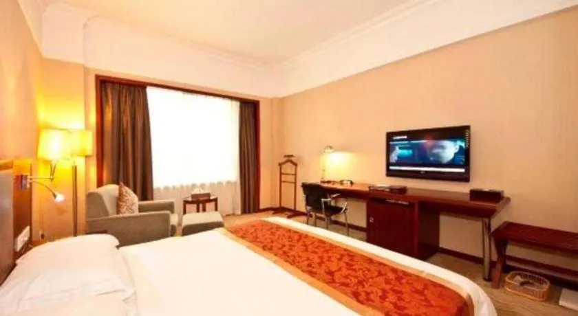 Bed in Fujian Galaxy Garden Hotel