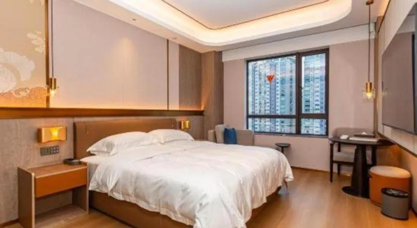 Bed in Fujian Galaxy Garden Hotel