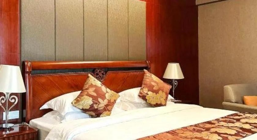 Bed in Fujian Galaxy Garden Hotel