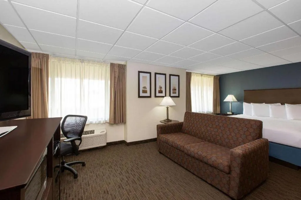 Bed in AmericInn by Wyndham La Crosse Riverfront-Conference Center
