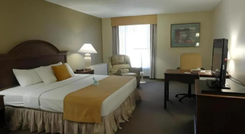 Bed in AmericInn by Wyndham La Crosse Riverfront-Conference Center