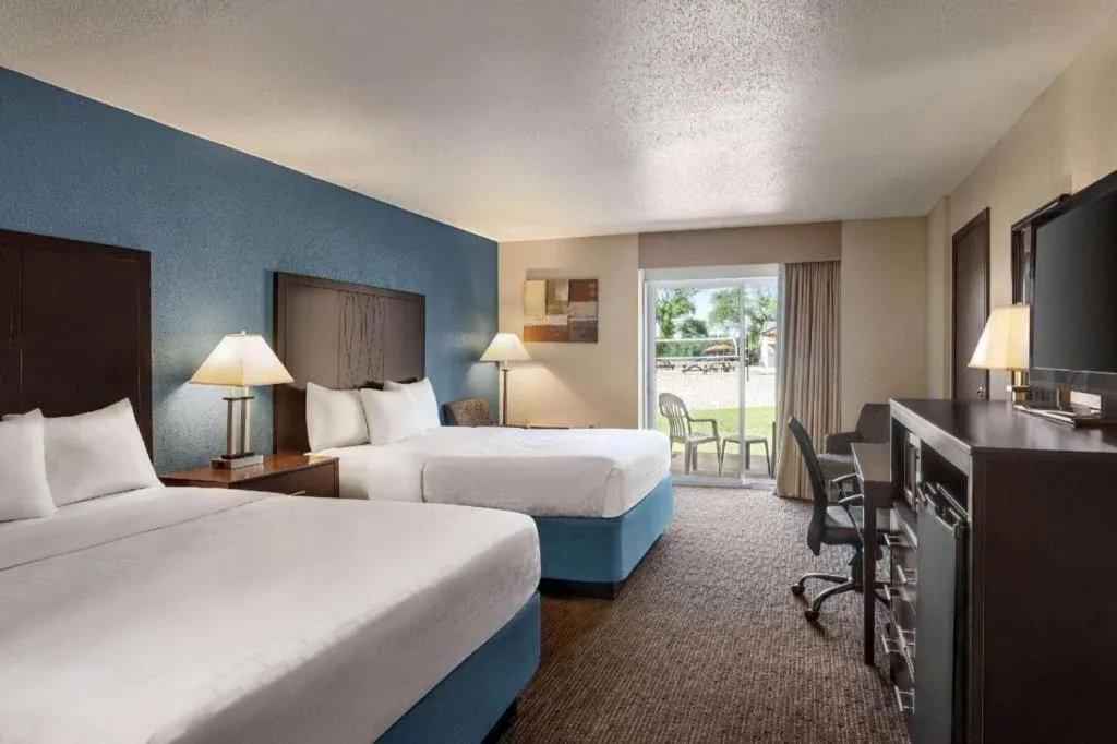 Bed in AmericInn by Wyndham La Crosse Riverfront-Conference Center