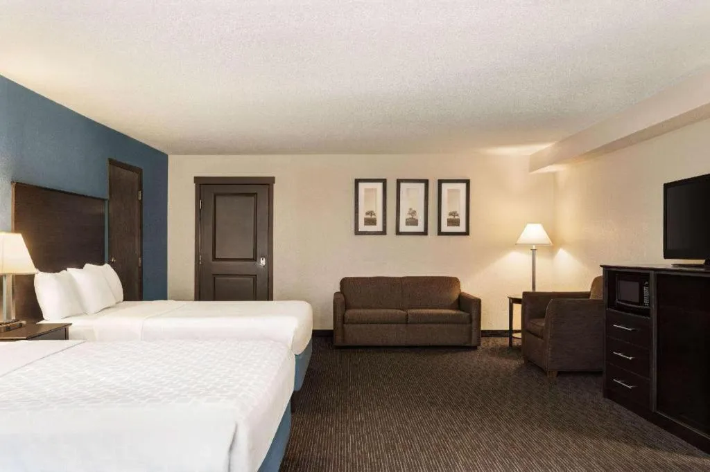 Bed in AmericInn by Wyndham La Crosse Riverfront-Conference Center