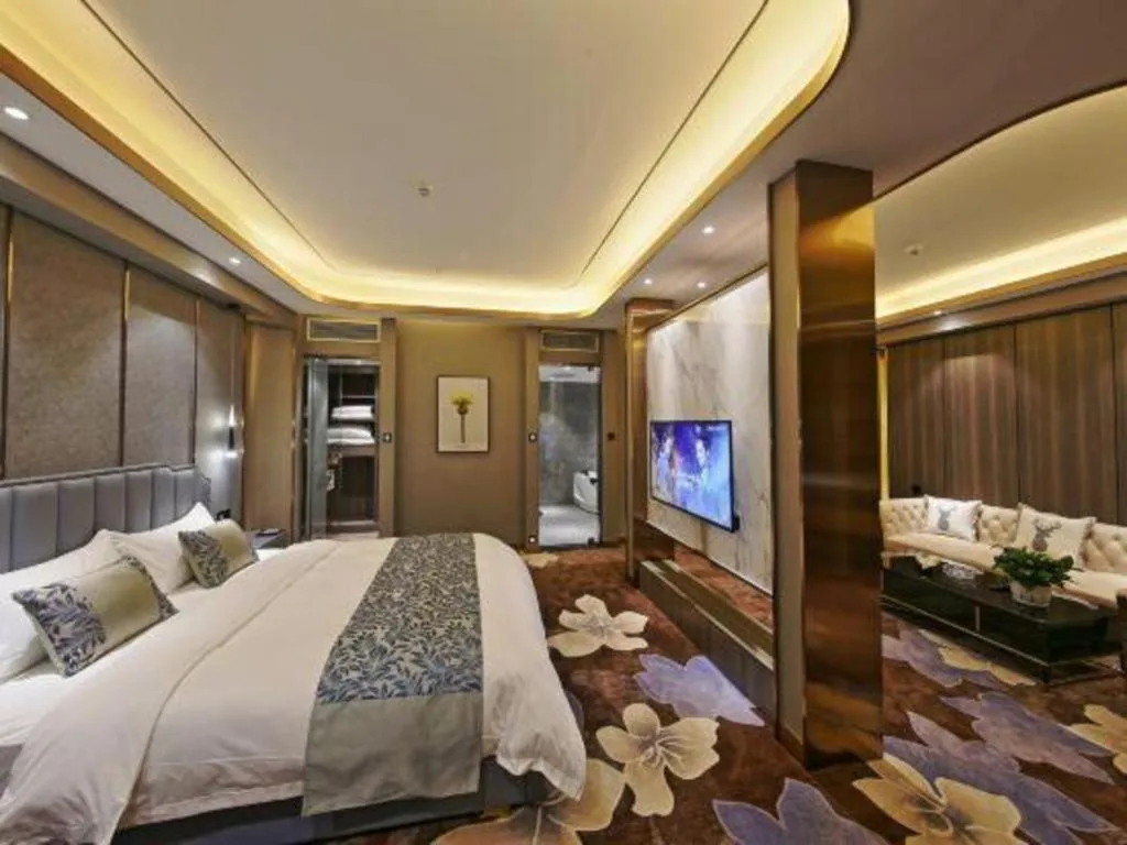 Bed in Dandong Rising Zhonglian Hotel