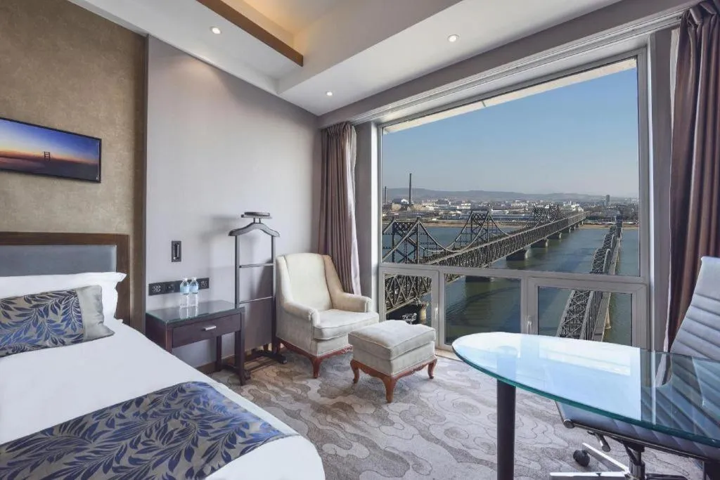 Bed in Dandong Rising Zhonglian Hotel