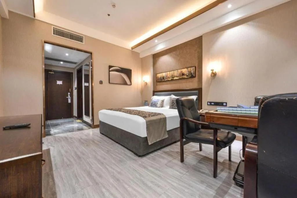 Bed in Dandong Rising Zhonglian Hotel