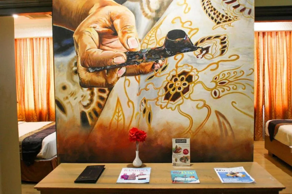 Bed in Amos Cozy Hotel Melawai