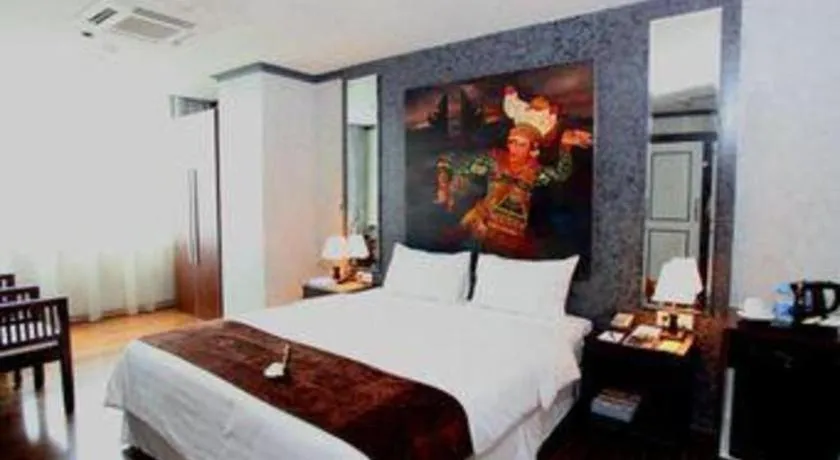 Bed in Amos Cozy Hotel Melawai