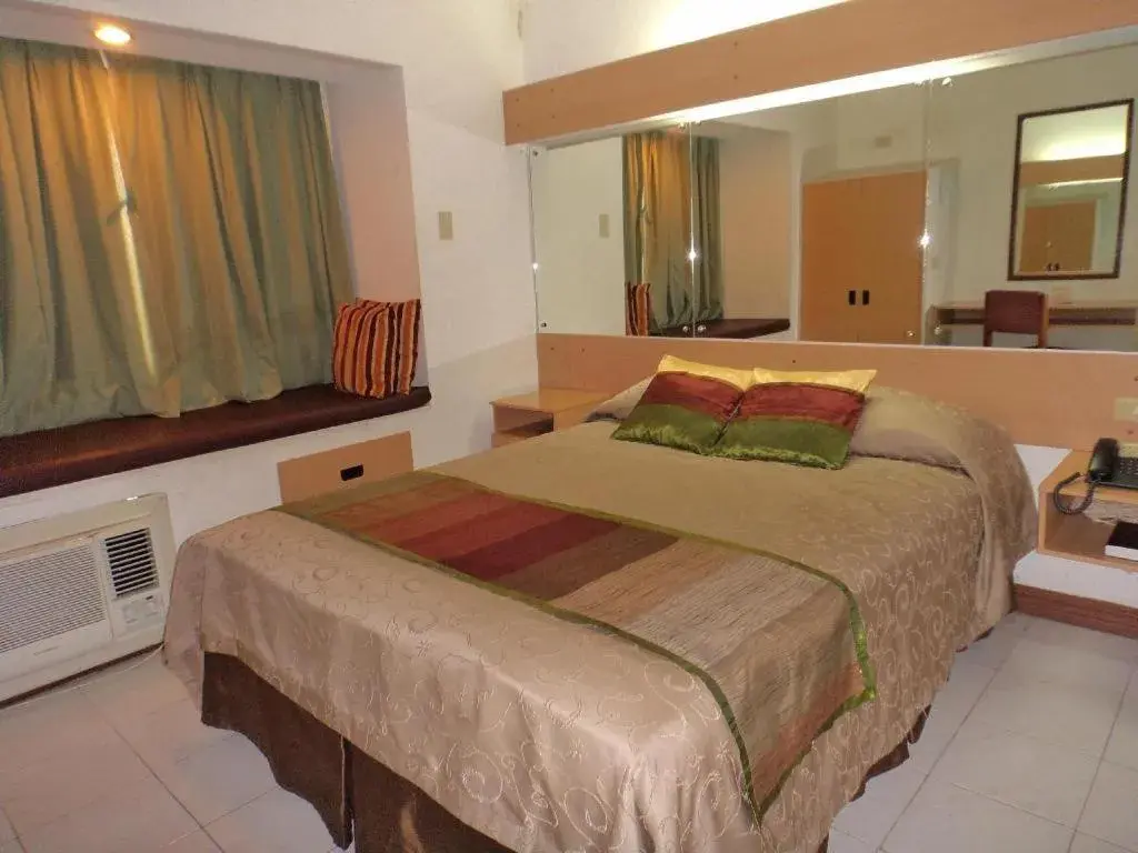Bed in Filipiniana Hotel Calapan Bed in Filipiniana Hotel Calapan