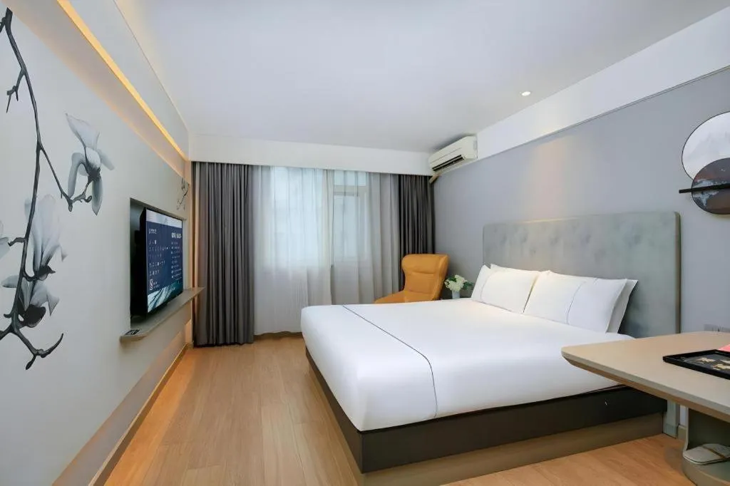 Bed in Magnotel Ningbo Tianyi Plaza Railway Station