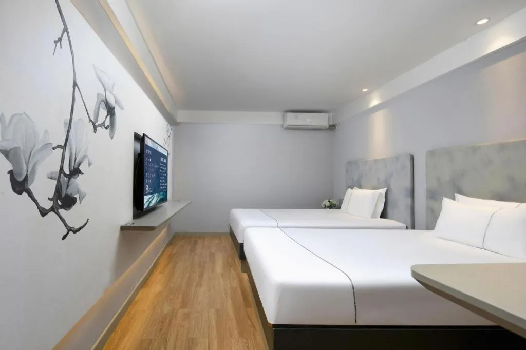 Bed in Magnotel Ningbo Tianyi Plaza Railway Station