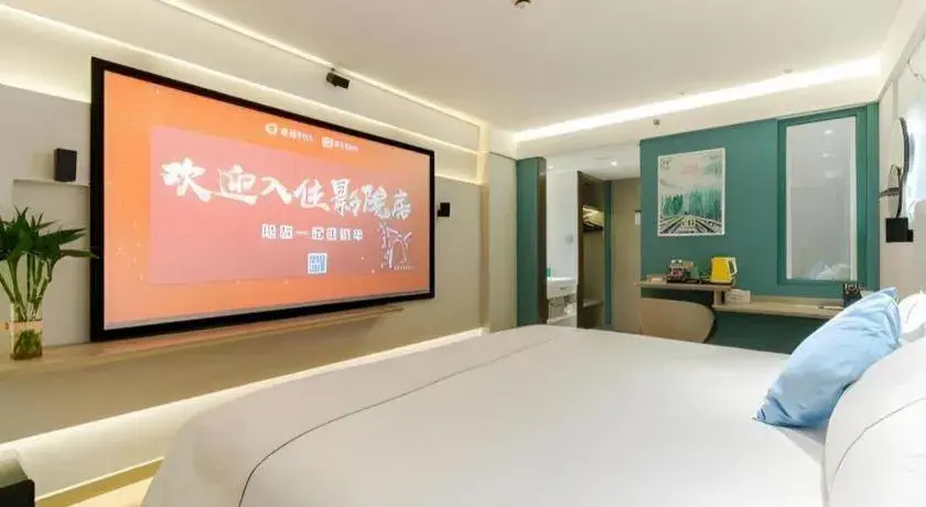 Bed in Magnotel Ningbo Tianyi Plaza Railway Station Bed in Magnotel Ningbo Tianyi Plaza Railway Station