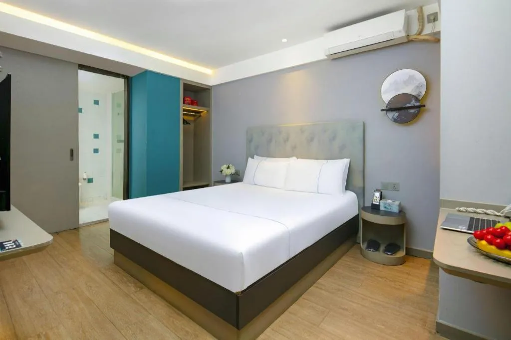 Bed in Magnotel Ningbo Tianyi Plaza Railway Station