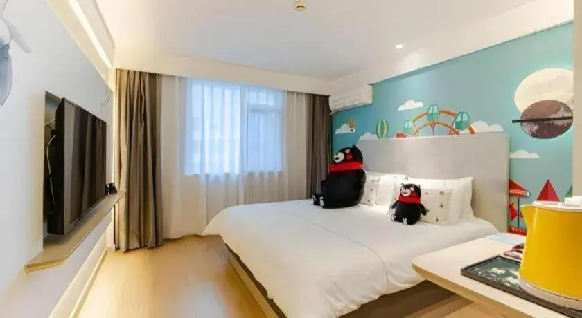 Bed in Magnotel Ningbo Tianyi Plaza Railway Station Bed in Magnotel Ningbo Tianyi Plaza Railway Station