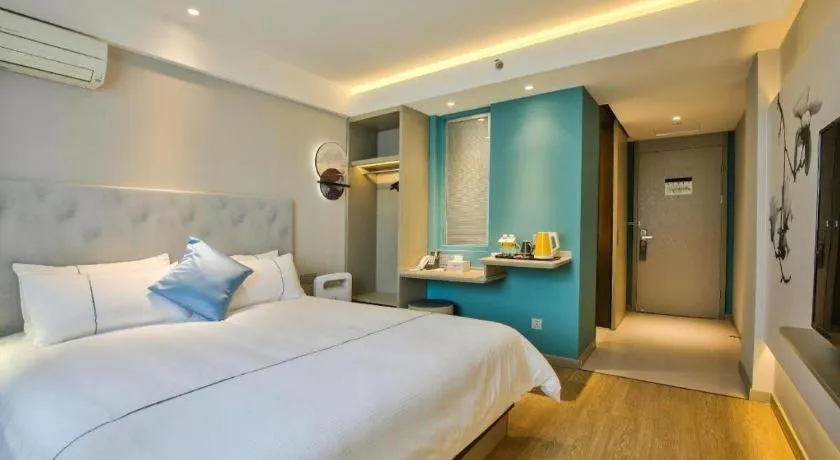 Bed in Magnotel Ningbo Tianyi Plaza Railway Station