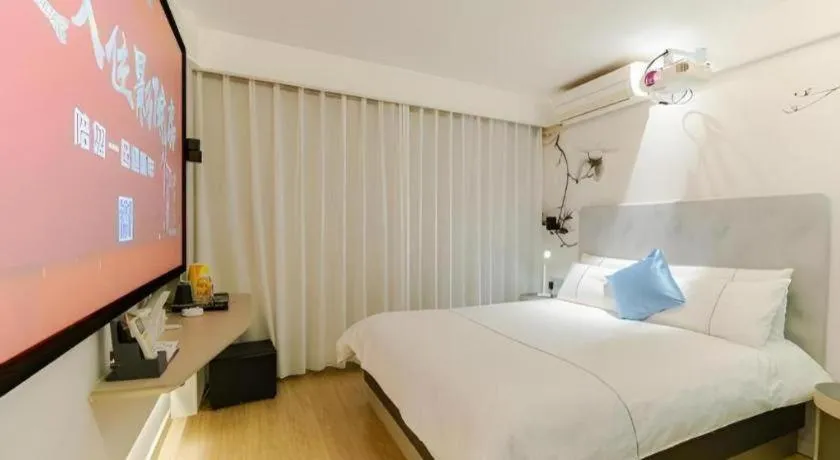 Bed in Magnotel Ningbo Tianyi Plaza Railway Station