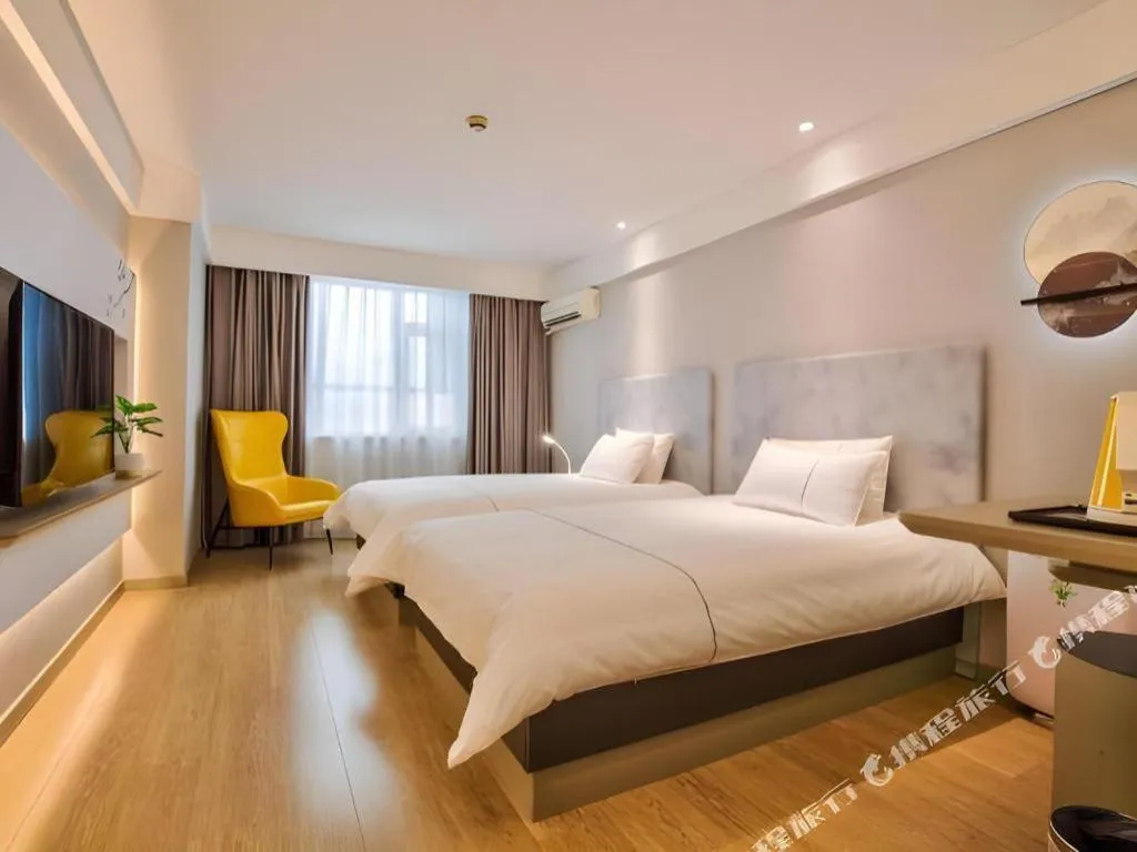 Bed in Magnotel Ningbo Tianyi Plaza Railway Station