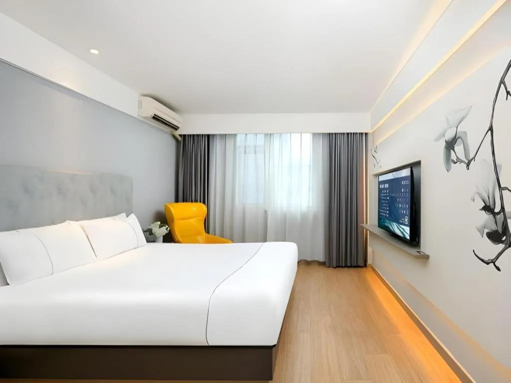 Bed in Magnotel Ningbo Tianyi Plaza Railway Station