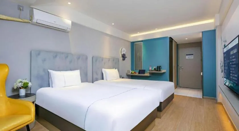 Bed in Magnotel Ningbo Tianyi Plaza Railway Station