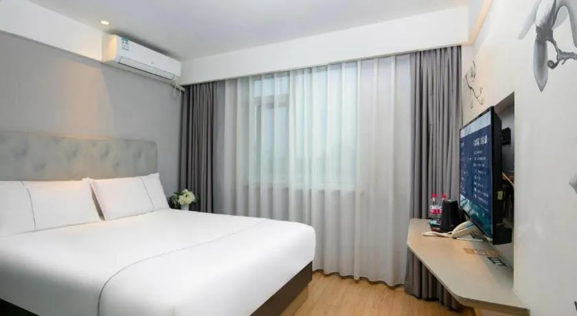 Bed in Magnotel Ningbo Tianyi Plaza Railway Station