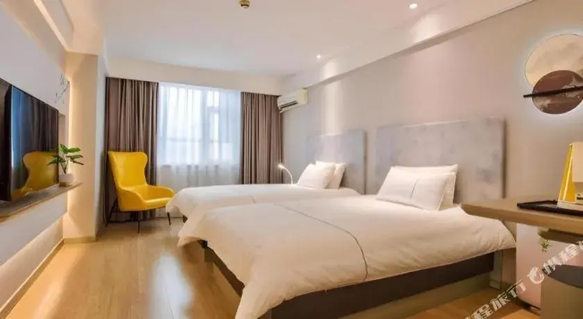 Bed in Magnotel Ningbo Tianyi Plaza Railway Station Bed in Magnotel Ningbo Tianyi Plaza Railway Station