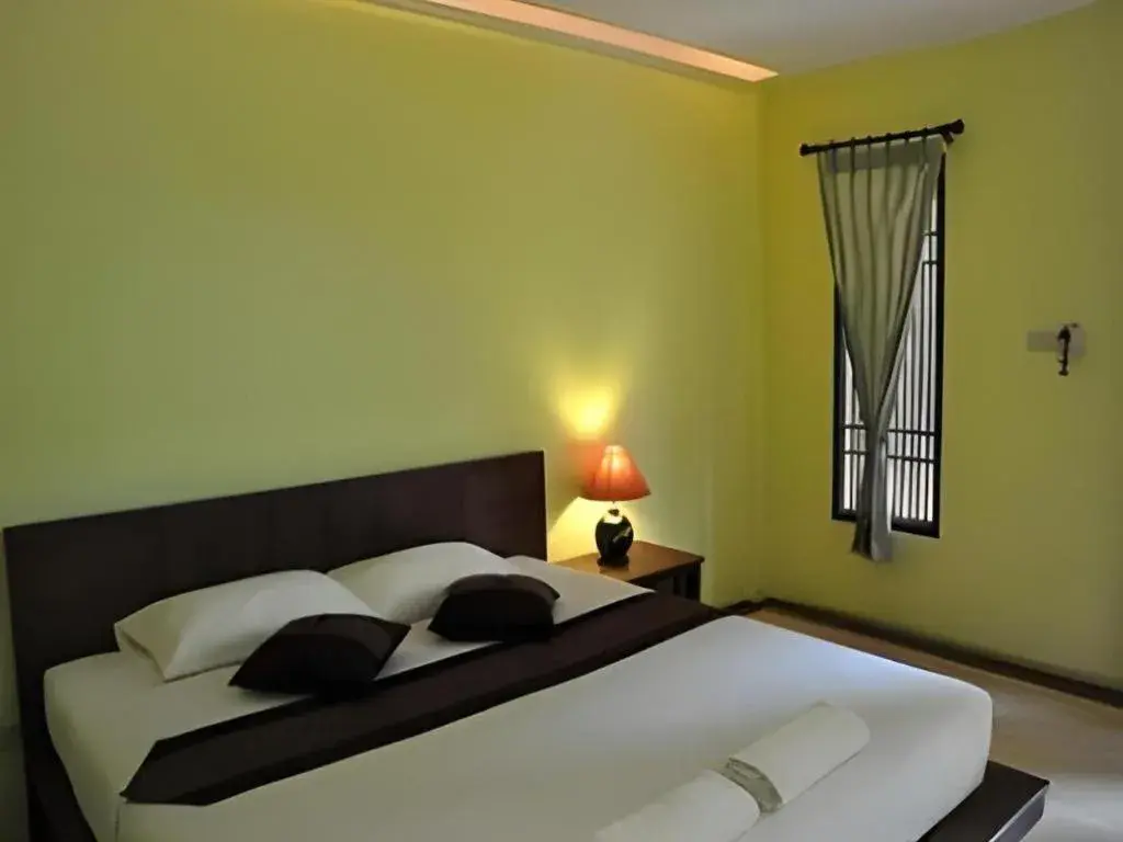 Bed in Baan Lapoon Hotel Bed in Baan Lapoon Hotel