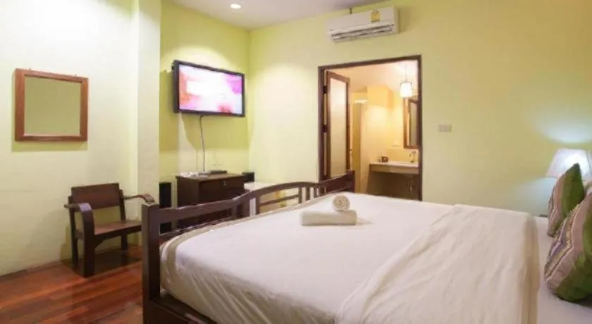 Bed in Baan Lapoon Hotel