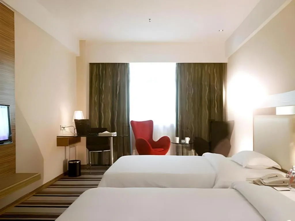 Bed in Orient Sunseed Hotel Airport Branch