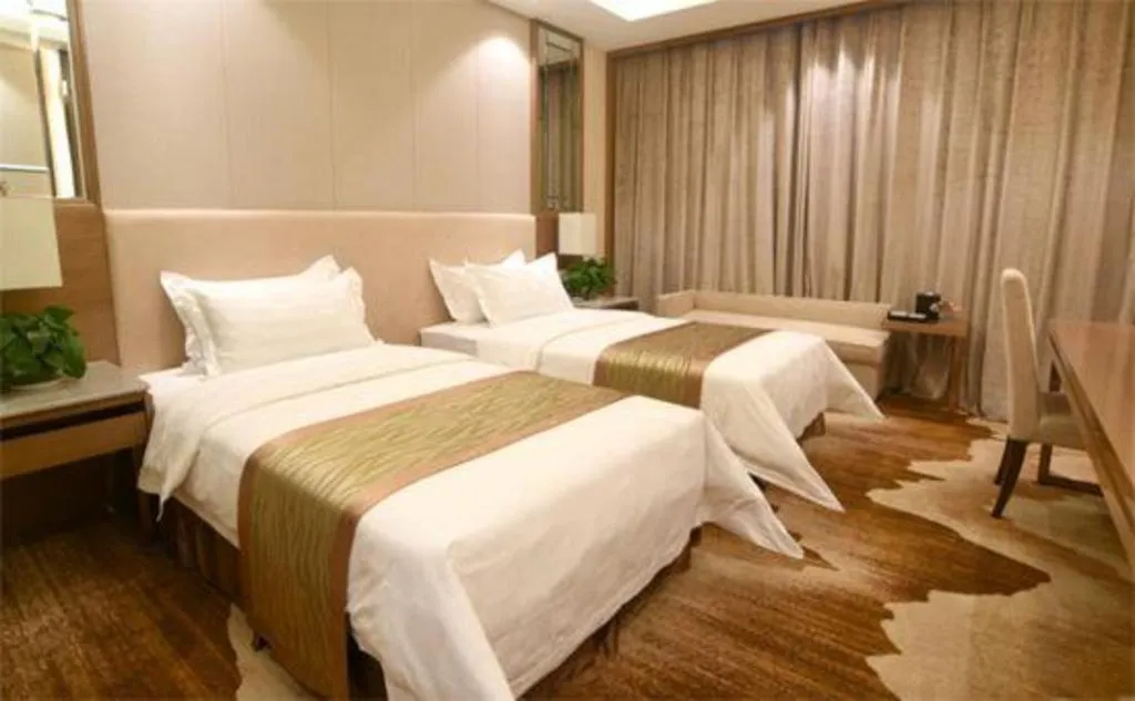 Bed in Jinan Blue Horizon Hotel Shizhong