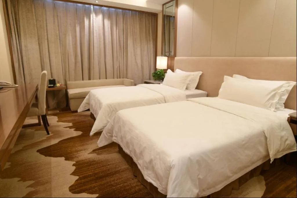 Bed in Jinan Blue Horizon Hotel Shizhong