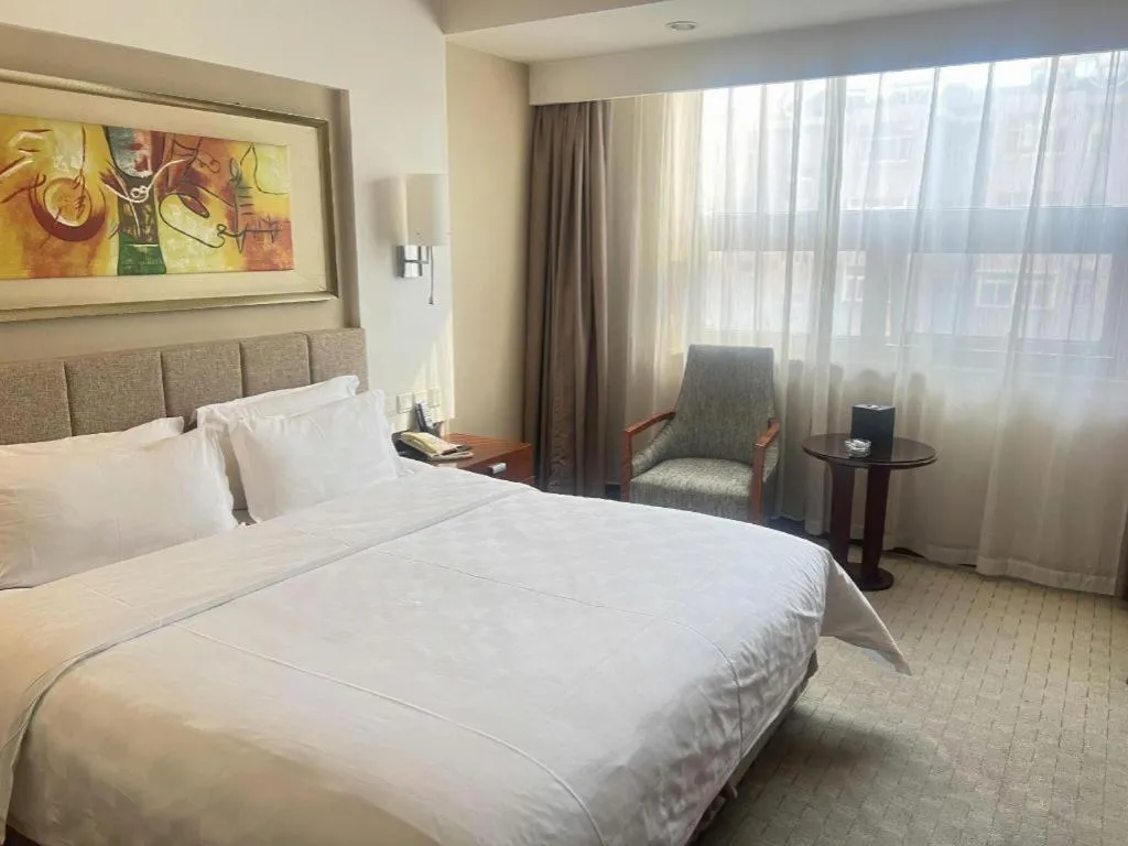 Bed in Jinan Blue Horizon Hotel Shizhong