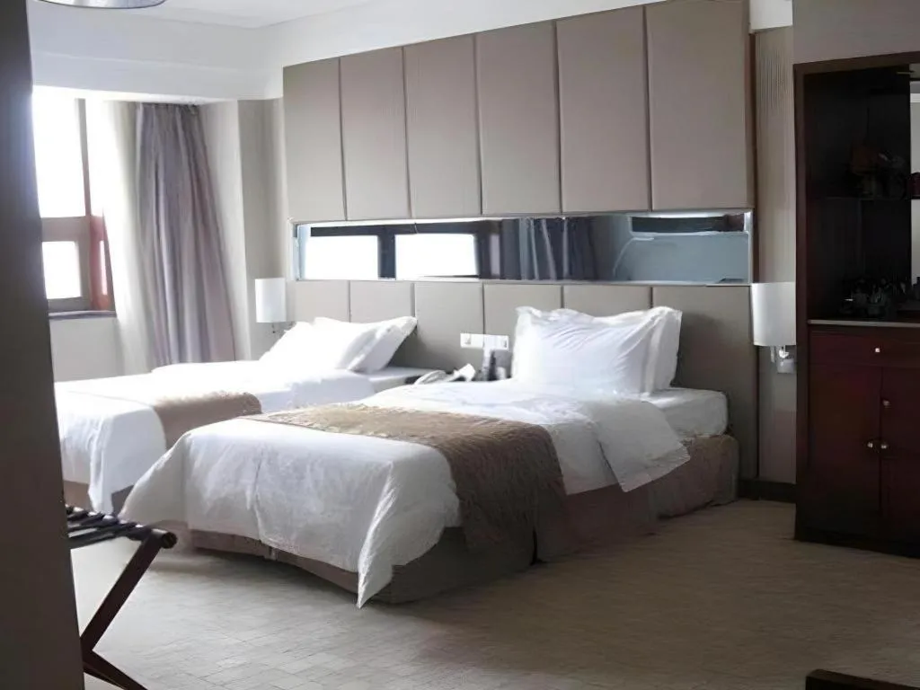 Bed in Jinan Blue Horizon Hotel Shizhong