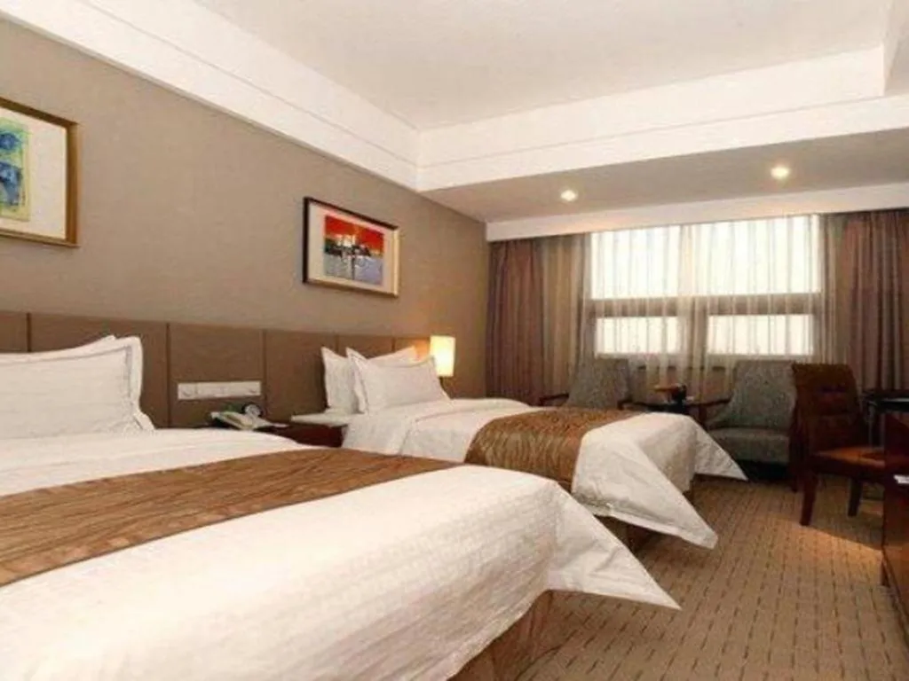 Bed in Jinan Blue Horizon Hotel Shizhong