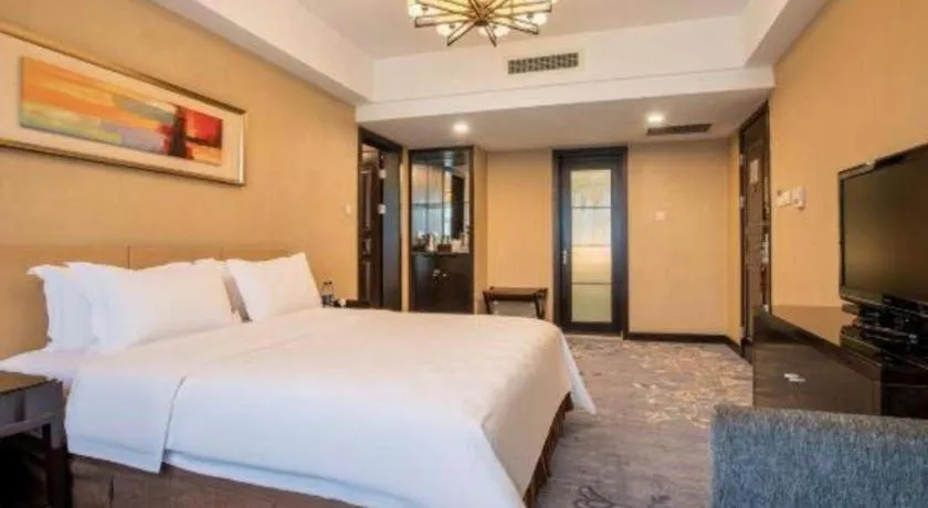 Bed in Zibo Blue Horizon International Hotel